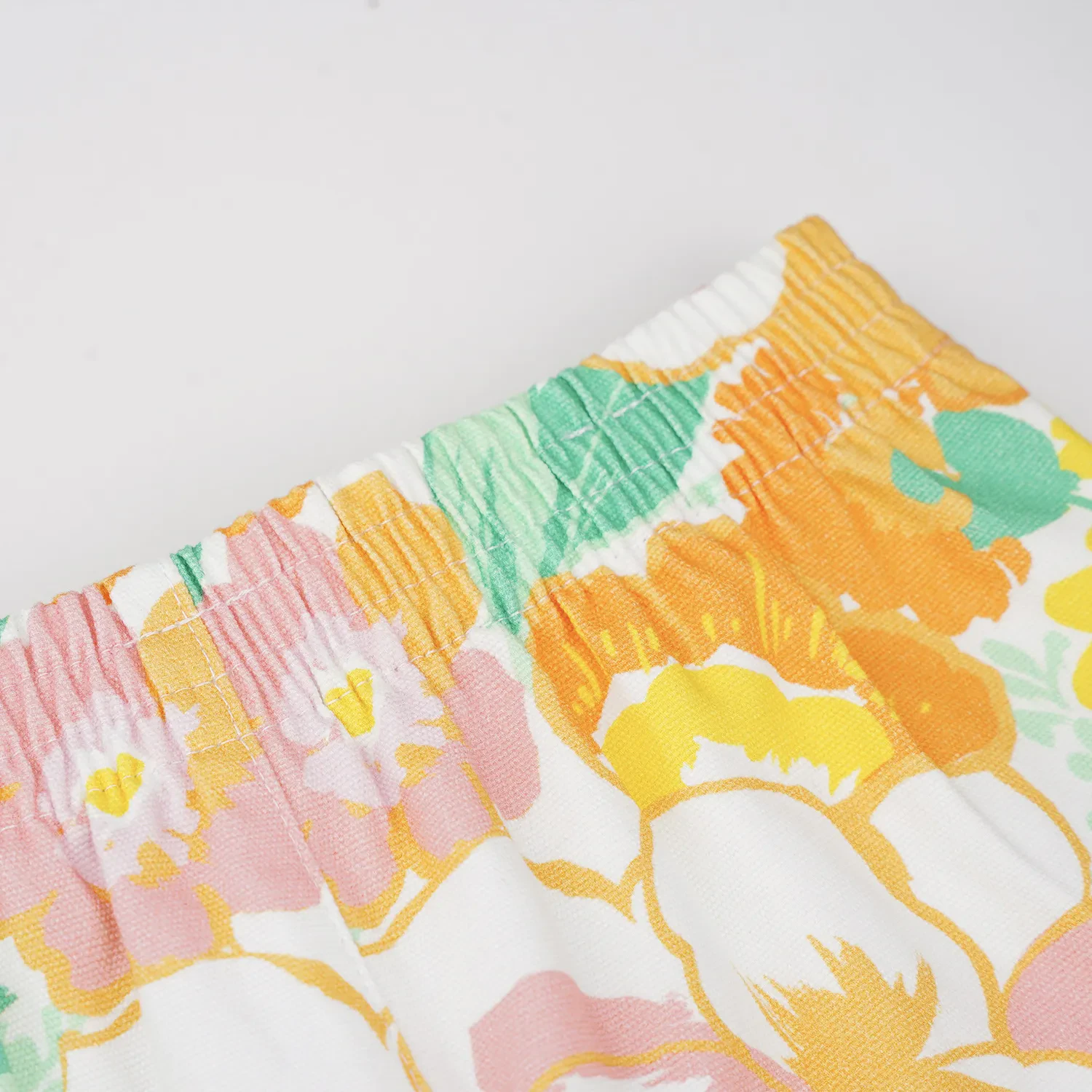 GIRLS LIGHT ORANGE FLOWER PASTELS PRINTED SHORTS