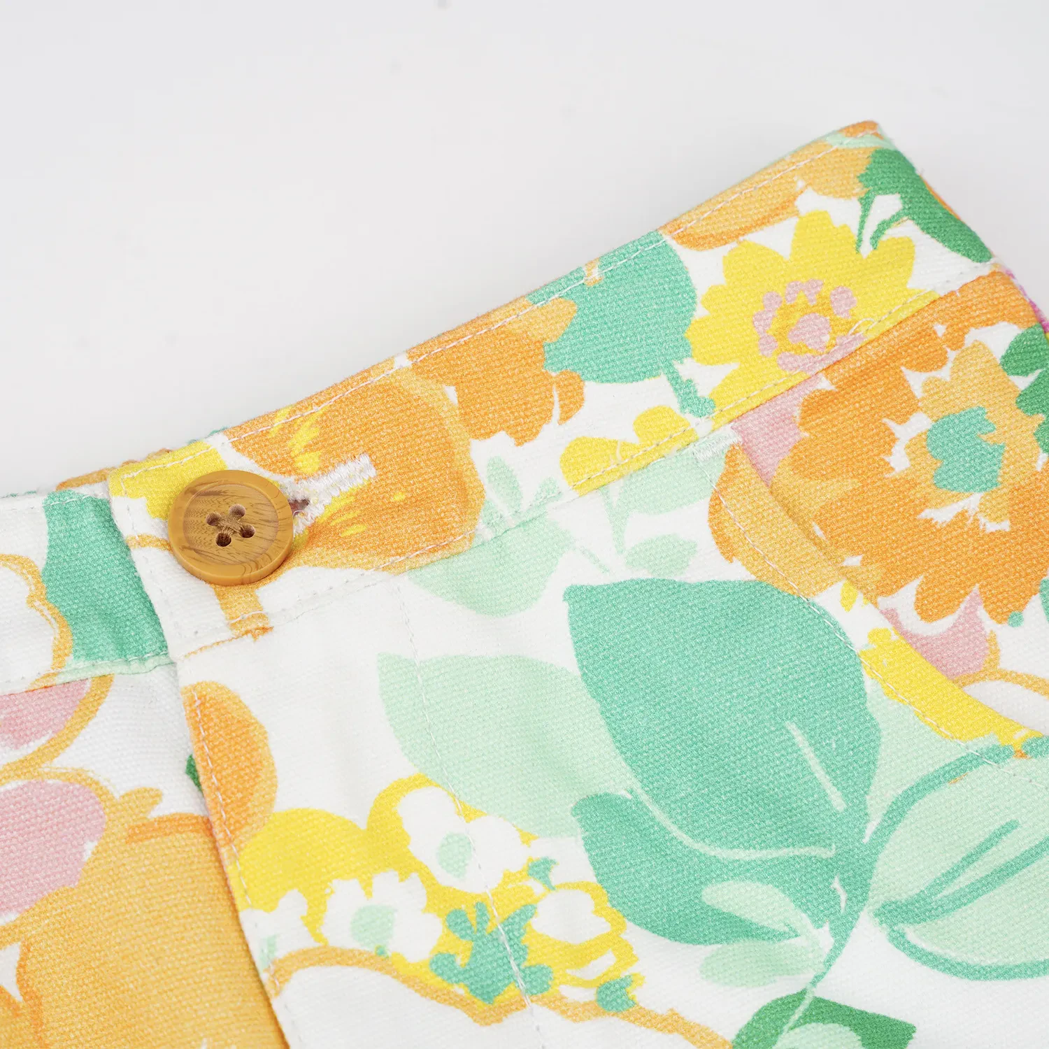 GIRLS LIGHT ORANGE FLOWER PASTELS PRINTED SHORTS