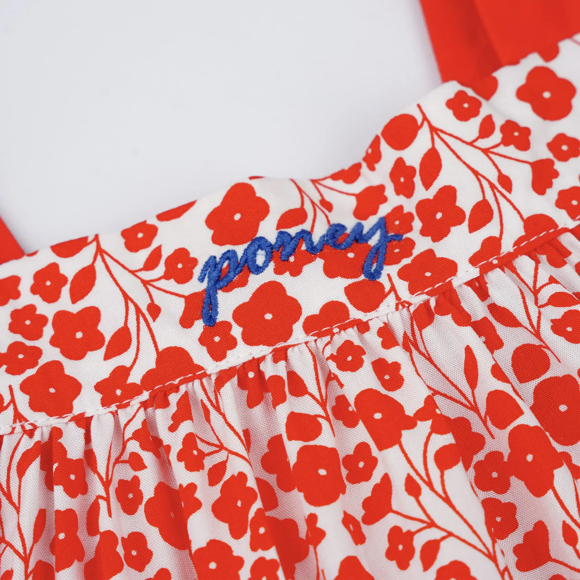 GIRLS RED FIESTA FLORAL SLEEVELESS BLOUSE